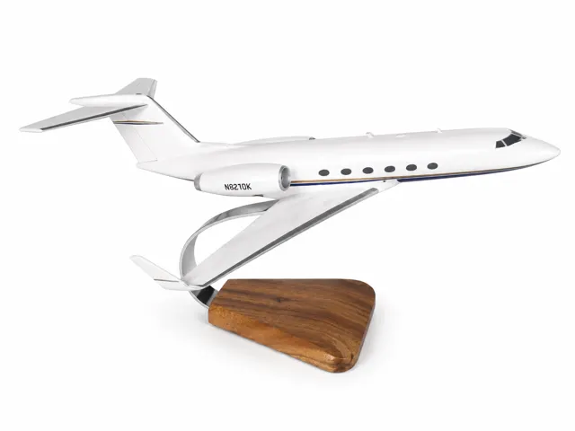 Handcrafted business jet model in a clean white livery with registration N8270K.